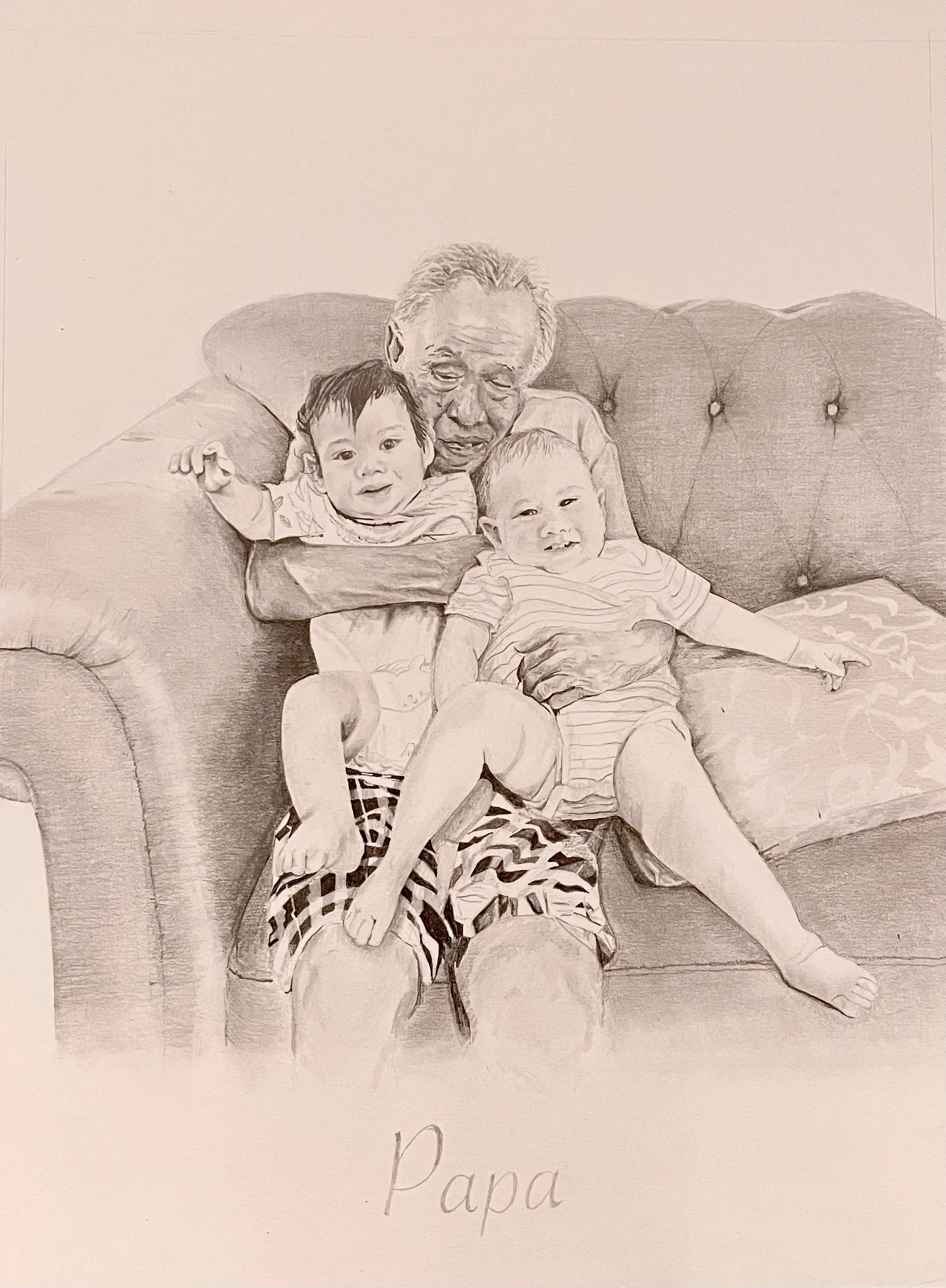 Drawing labeled Papa, showing an older man seated on a sofa holding two young children.
